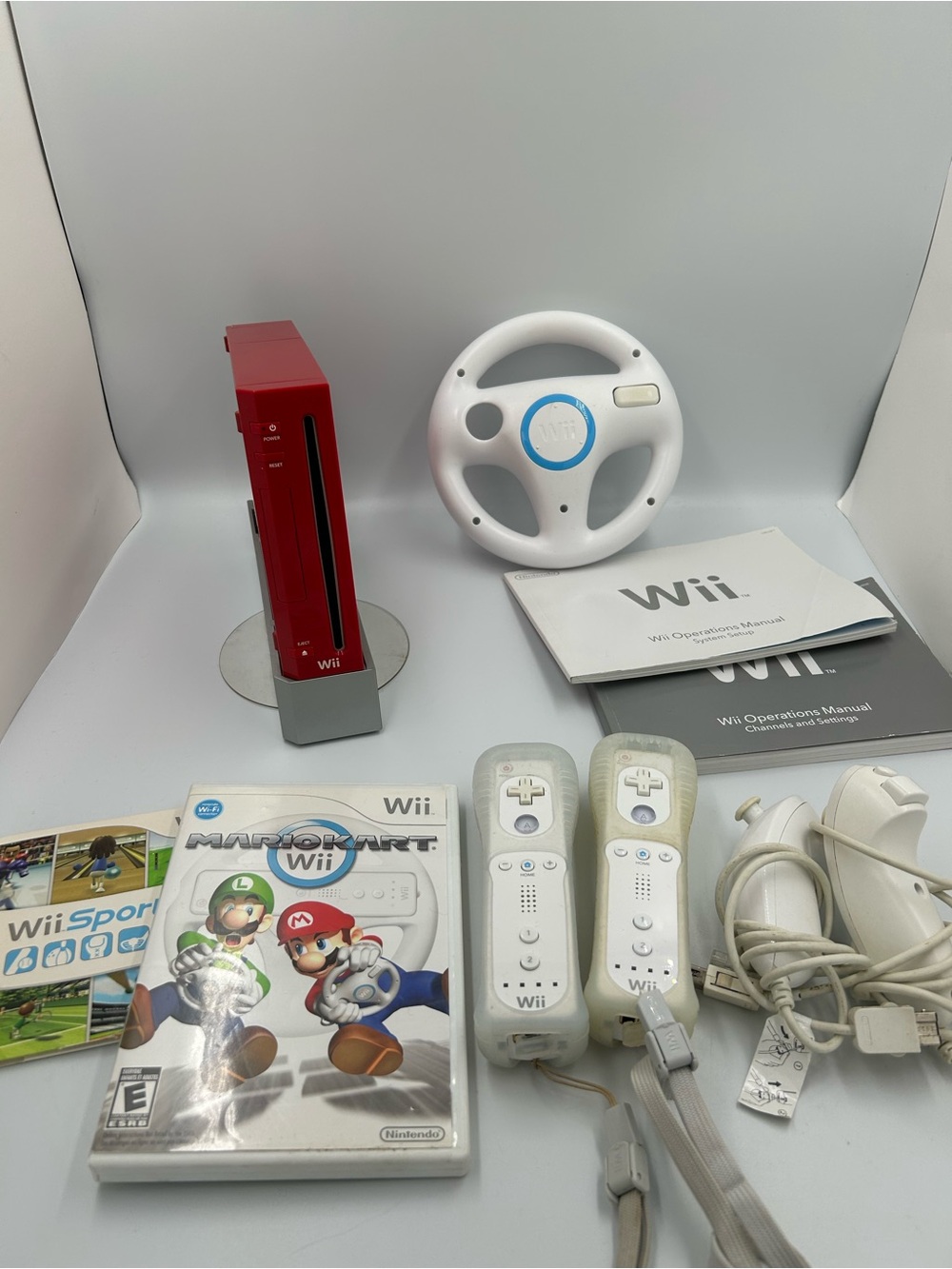 Nintendo RVL-101 Wii Console - (red) with controllers and games bundle